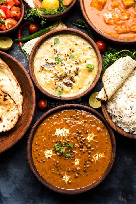 indian lunch or dinner items like dal paneer butter masala roti rice salad stock image