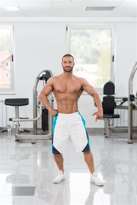 Bodybuilder Flexing Muscles Stock Image Image Of Handsome Adult