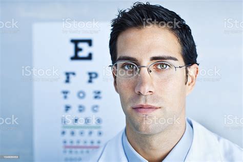 Optician In Front On Eye Chart Stock Photo Download Image Now 30 34