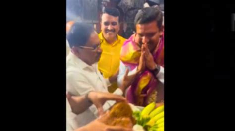 Karnataka Polls Bs Yediyurappas Son Vijayendra Touches Congress Leaders Feet Inside Temple