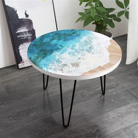 This is an epoxy coffee table with live edge walnut slabs, blue epoxy resin, a steel base, and multicolor leds! Resin ocean wave coffee table Epoxy beach side table - Tables