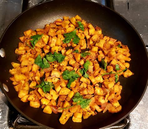 Sliced bananas are marinated with spices and shallow fried in tawa. Raw Banana Fry/Aratikaya Fry