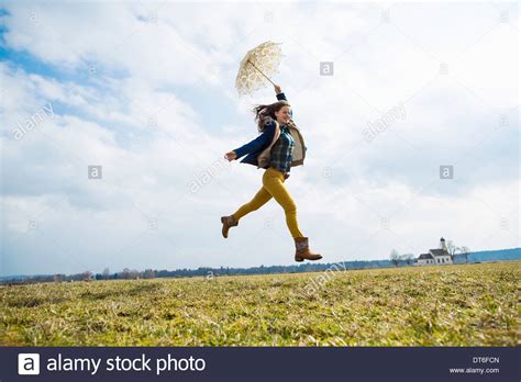 Teenage Girl In Field Umbrella Hi Res Stock Photography And Images Alamy