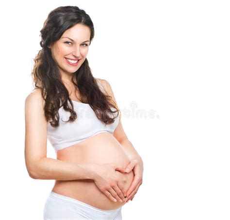 Gravid Kvinna Med Den Nakna Buken Och Vita Blommor Arkivfoto Bild Av