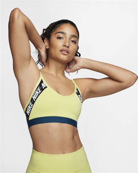 Stop tucking your key under your bra strap and tuck it away in a legit pocket in your women's nike swoosh pocket bra. Nike Indy Women's Light-Support Logo Sports Bra. Nike AU