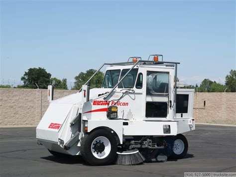 Elgin recognizing the health hazards of inadequate street sanitation, elgin, il resident and inventor john murphy designed the first motorized street sweeper in 1914. 2004 Elgin Pelican Three-Wheel Mechanical Street Sweeper for Sale