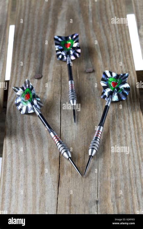 Three Sharp Dart Pins Stock Photo Alamy