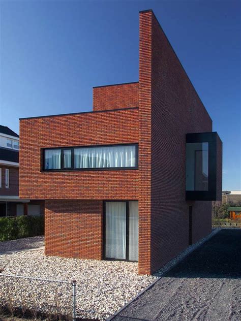 Brick Wall House Boasts Minimalist Style With Maximum Appeal