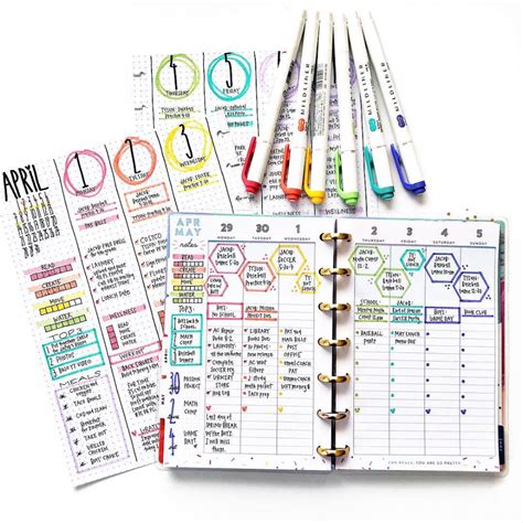 An Open Planner With Markers And Stickers On It