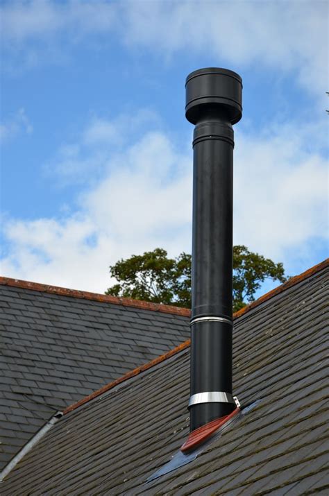 Flue Pipe For Boiler Coming Through A Slate Roof Wood Stove Chimney