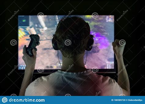 Gamer With Gamepad Happy To Win In The Online Game The Player With