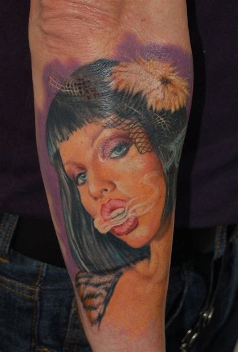 Portrait Style Colored Arm Tattoo Of Smoking Seductive Woman With