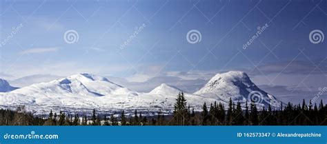 Panoramic View Of Scandinavian Mountain Range Covered By Ice And Snow