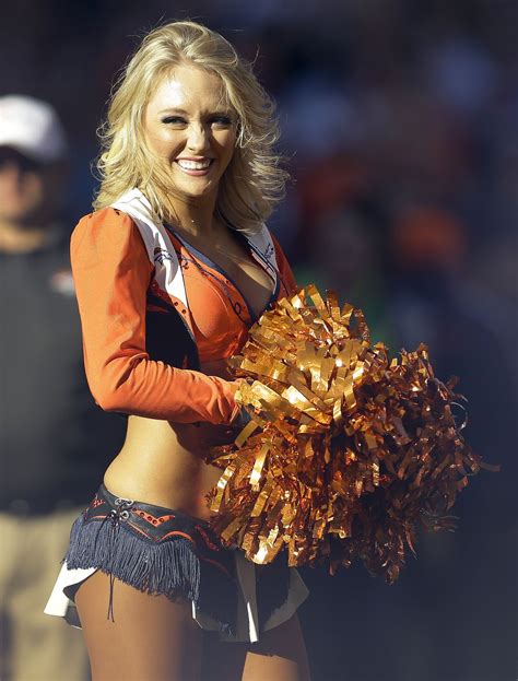 A Denver Broncos Cheerleader Performs During An Nfl Football Game