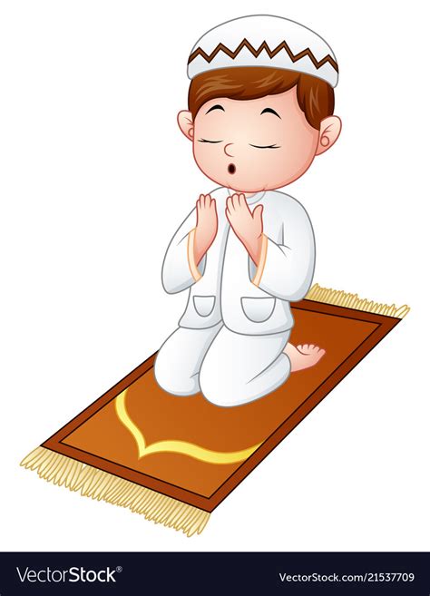 Muslim Kid Sitting On The Prayer Rug While Praying