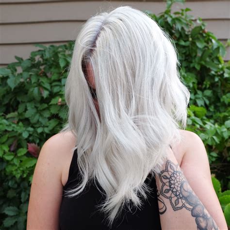 solid white platinum hair on a long styles lob haircut ice blonde hair blonde lob lob haircut