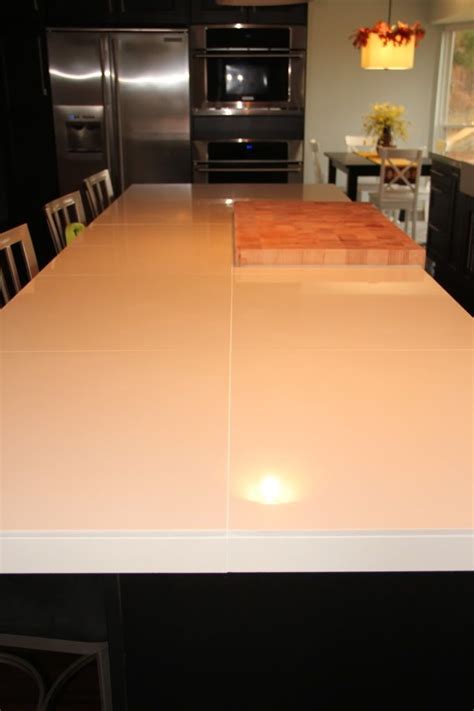 Bathroom shower from porcelain slabs. rectified porcelain 24 x 24" tiles as a countertop - from ...