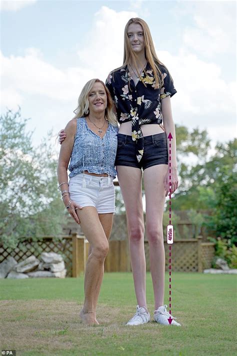 That S Pin Credible Woman Who Stands Tall At Ft In Has The Longest Legs In The World