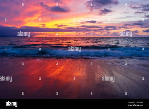 A Beautiful Ocean Sunset Seascape Wave With A Colorful Sunset Sky As A