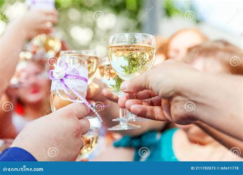 Cheers Group Of People Drinking And Toasting In Restaurant Hands
