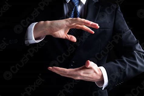 Man Holding His Hands Out And Showing Something Stock Photo 855723