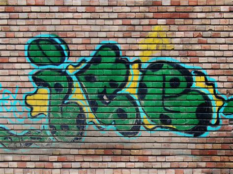 Free Graffiti Image Painted On Brick Wall Paint Stains And Splatter