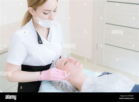 Cleaning Procedure In The Office Of Cosmetology Cosmetologist In Pink