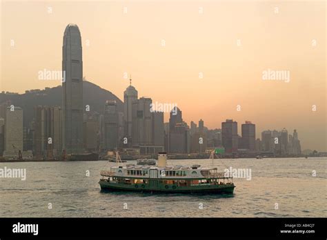 A Sunset View Of Skyscrapers On Hong Kong Island Over Victoria Harbour