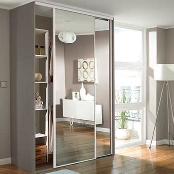 The task designing fitted wardrobes with mirror sliding doors in an awkward shaped space. Budget Sliding Doors | ScrewfixWardrobes