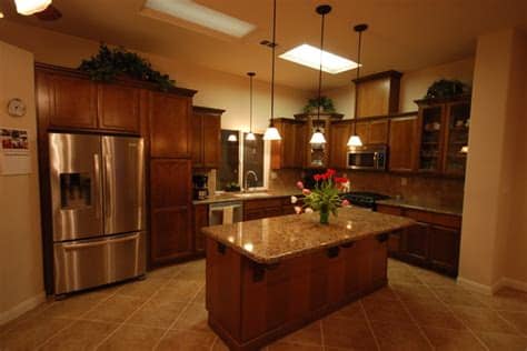 Click on one of the gallery thumbnails below to see the different kitchen cabinet options that we offer. Maple Cognac Kitchen Cabinets - Wow Blog