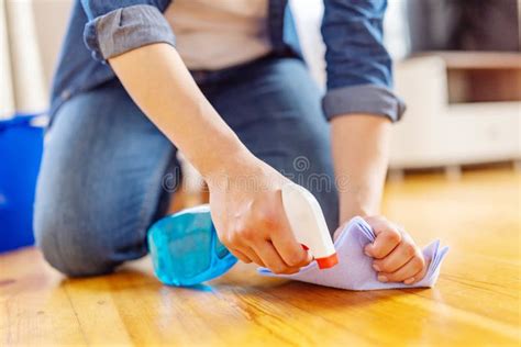 Woman Is Mopping Floor With Rag And Detergent Housekeeping And