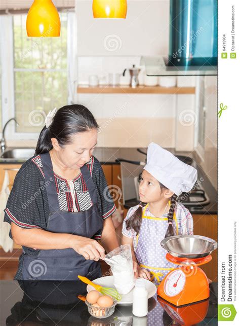 Mother Teaching Daughter To Scooping Wheat Flour Stock Photo Image Of
