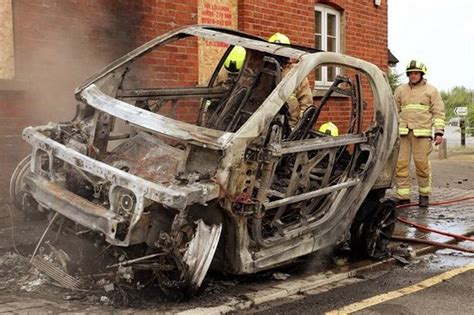 Electric Car Bursts Into Flames After It Was Left Charging Outside