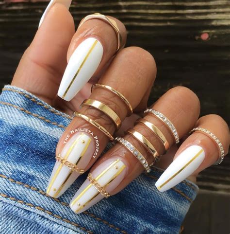 Pin by LaTroya Bailey on Nails | Coffin nails designs, Gold nails