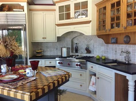 Design studio's board wolf cabinetry on pinterest. Showroom Kitchen, Plain & Fancy Cabinets with soapstone countertop, and wenge and maple ...