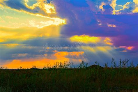 The Rays Of The Sun Passing Through The Clouds Stock Photo Image Of