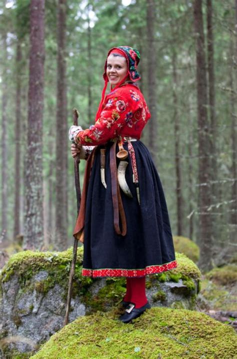 norway folk costume from dala floda the red embroidered jacket is called “påsömströja” in her