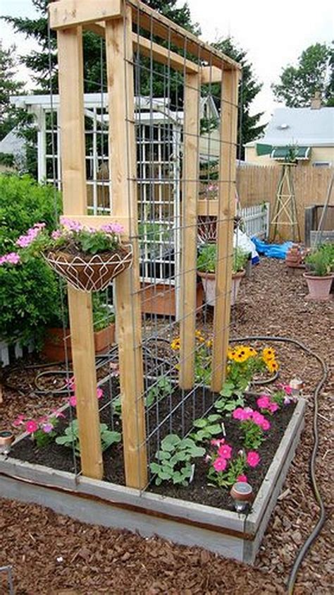 If you are using trellis panels, pound the fence posts into the ground at intervals equal to the length of each panel. 20+ Awesome DIY Garden Trellis Projects - Hative