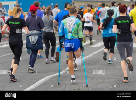 Runner On Crutches Hi Res Stock Photography And Images Alamy
