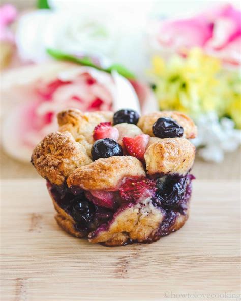 Place the pieces in the pan with the butter mixture and use your hands to. Breakfast Berry Monkey Bread Cups! Mini monkey breads ...