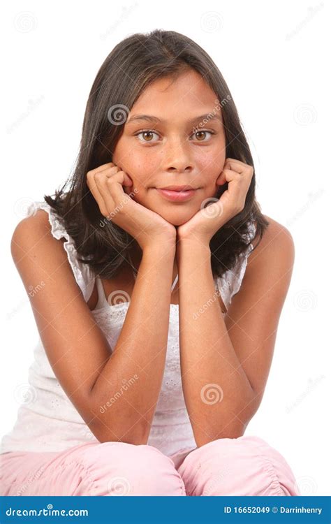 Teenage Girl Sitting Chin On Hands In Relaxed Pose Picture Image 16652049