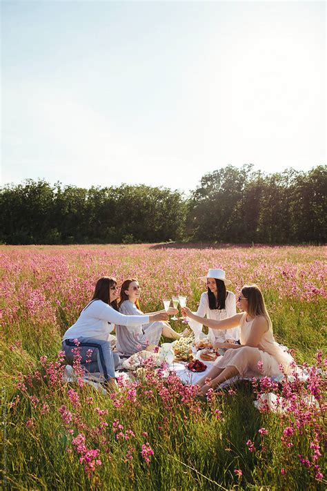 Picnic For Four Girlfriends Women Friendship Summer Portrait By Stocksy Contributor Liliya