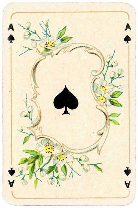 An Ace Playing Card With Flowers And Leaves On The Front Inlaid To It