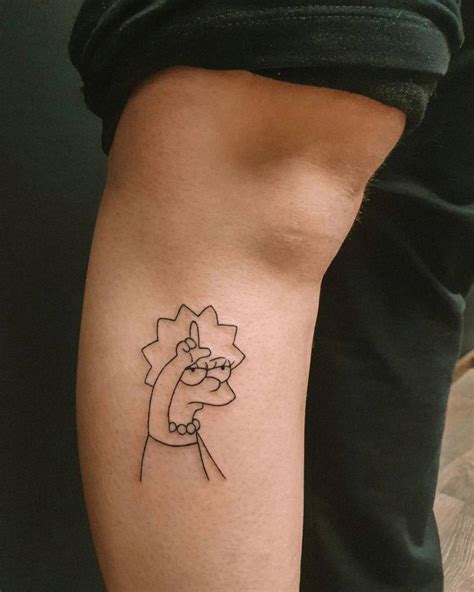 Cartoon Style Lisa Simpson Tattoo Done On The Shin
