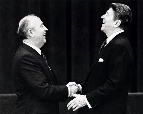 President Ronald Reagan Shaking Hands With Mikhail Gorbachev In Geneva