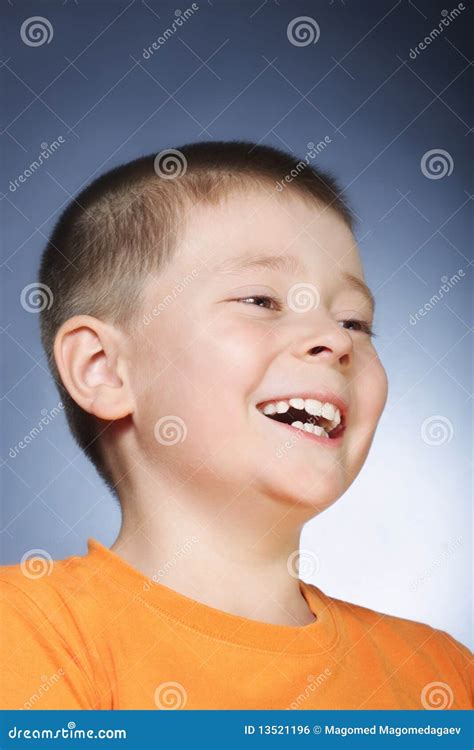 Laughing Kid In Orange Shirt Stock Photo Image Of Vertical Positive