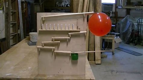 Rube Goldberg Machine Science Project Dominoes Falling In Slow