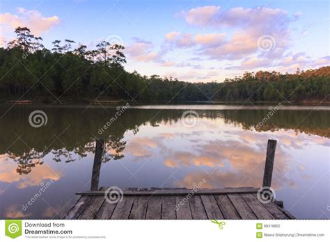 Wooden Dock On Serene Lake With Sunset Stock Photo Image Of Dock