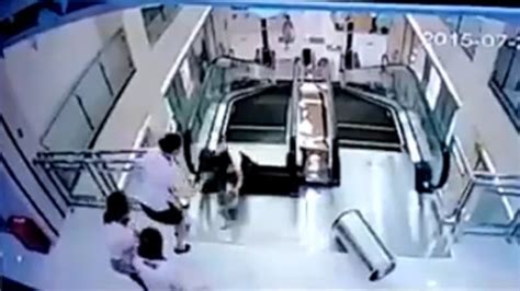 Chinese Woman Dies After Being Trapped In Escalator But Saves Son