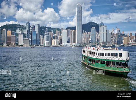 A Star Ferry Leaves The Tsim Sha Tsui Ferry Pier And Heads Across The